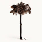 Luvamira Bamboo Reach ostrich feather duster standing upright on a warm off-white background.