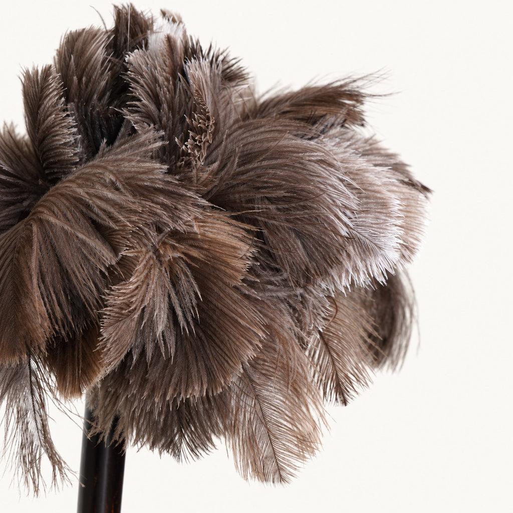 Side-angle close-up of the natural ostrich feather texture on the Bamboo Reach duster.
