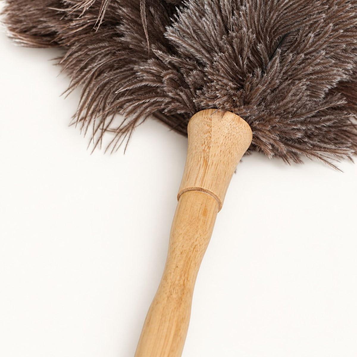 Pale beech wood collar and feather root detail on the Luvamira Classic Handheld duster.