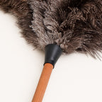 Close-up of the feather roots and black connector on the Luvamira Essential Handheld duster.