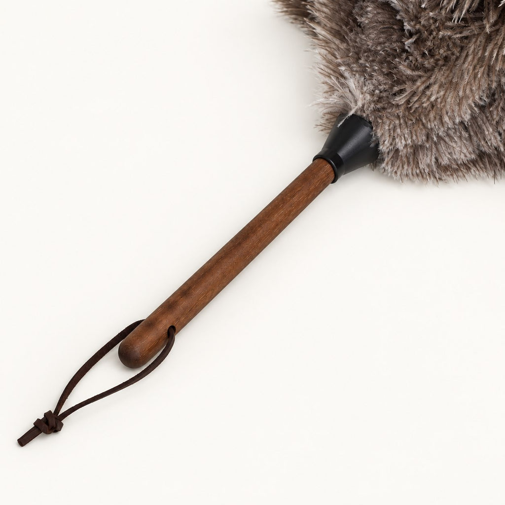 Dark walnut handle and leather hanging loop detail on the Luvamira Select Handheld duster.