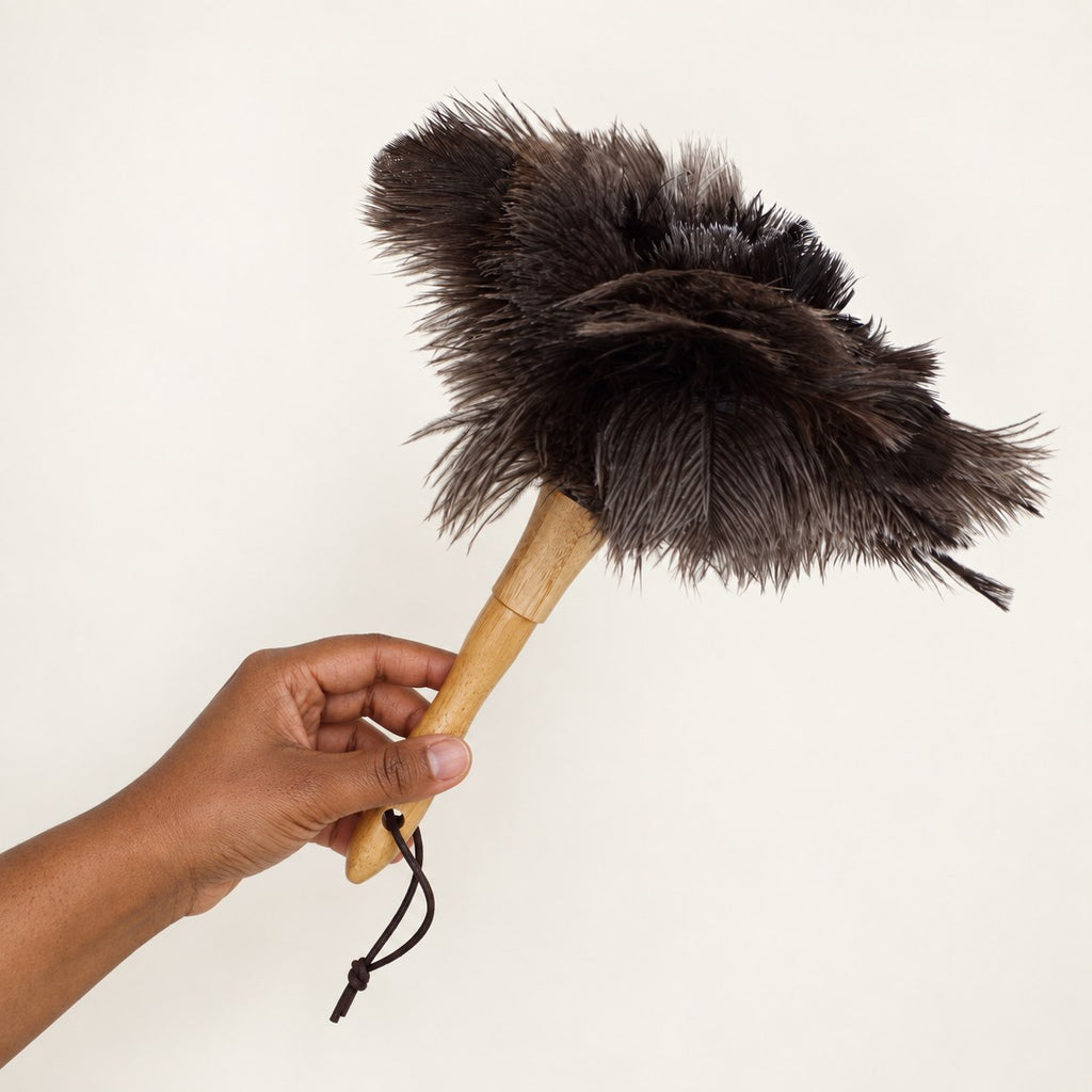 Upright in-hand view of the Luvamira Classic Handheld ostrich feather duster.
