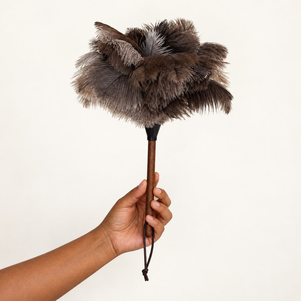 Upright in-hand view of the Luvamira Select Handheld ostrich feather duster.