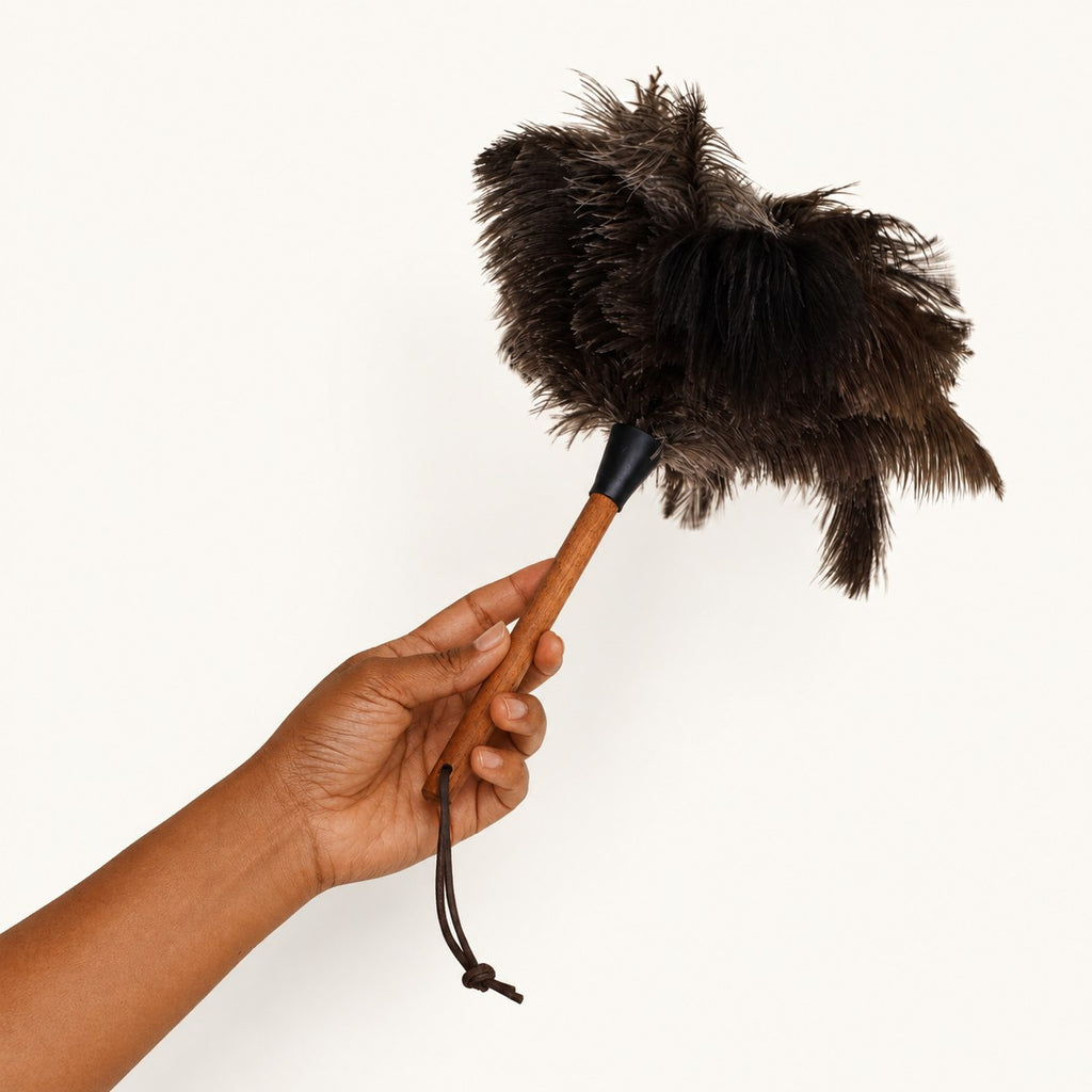 Alternate in-hand view of the Luvamira Essential Handheld ostrich feather duster and hanging loop.